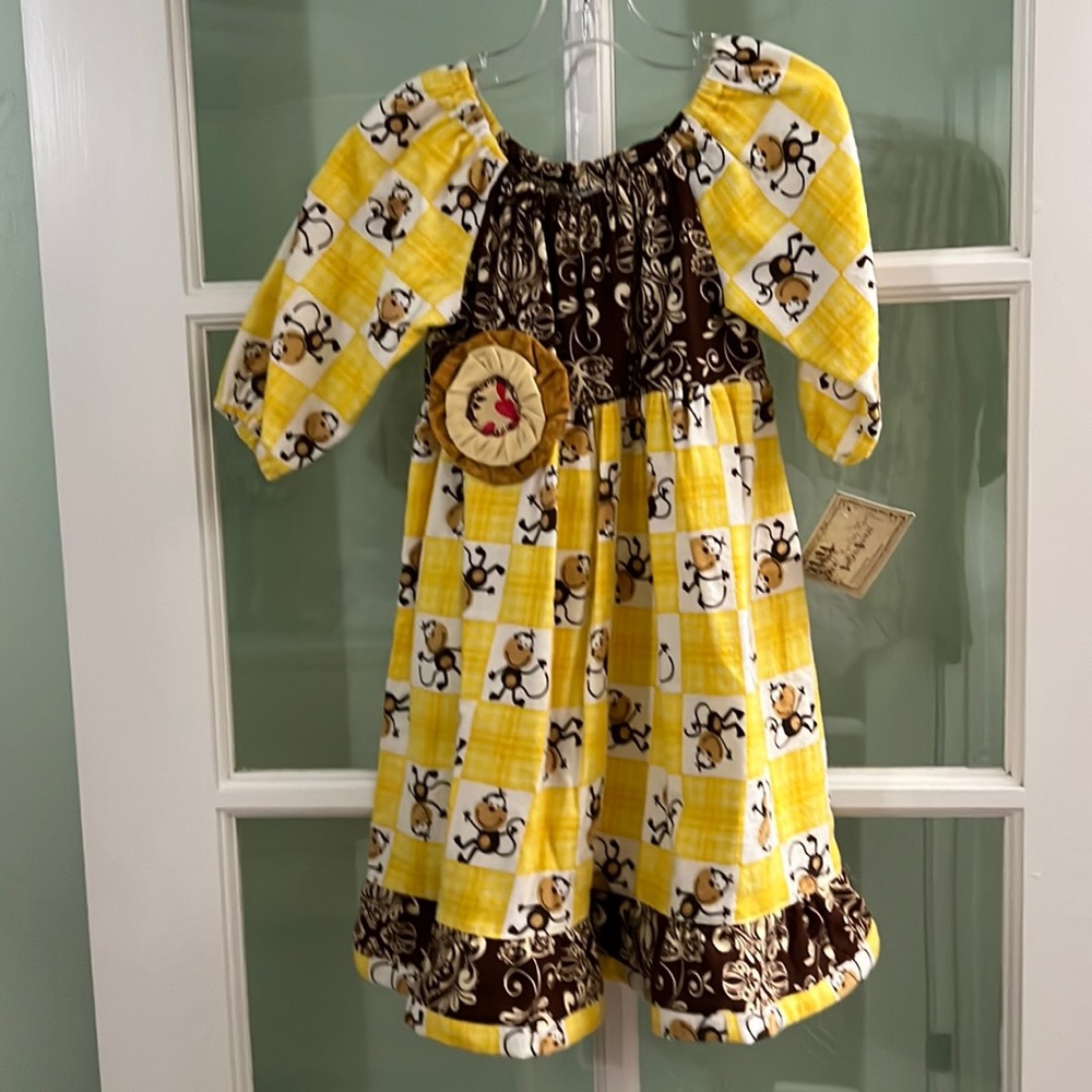 New handmade girls’ dress in a size 3.